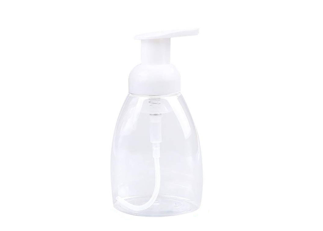 Le cosmétique en plastique d'utilisation quotidienne met la bouteille en bouteille écumante de savon de pompe blanche