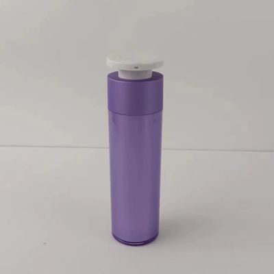 Bouteille pour distributeur cosmétique en plastique violet avec pompe à pression blanche