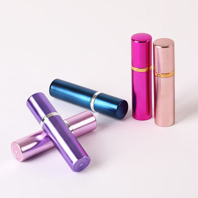 Flacon pulvérisateur de parfum portable en aluminium rose de luxe avec anneau métallique