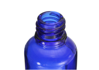 Bouteilles vides bleues d'huile essentielle de 30 ml avec l'emballage commode de compte-gouttes en verre