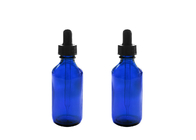 Bouteilles vides bleues d'huile essentielle stockant des produits chimiques de chimie de parfums