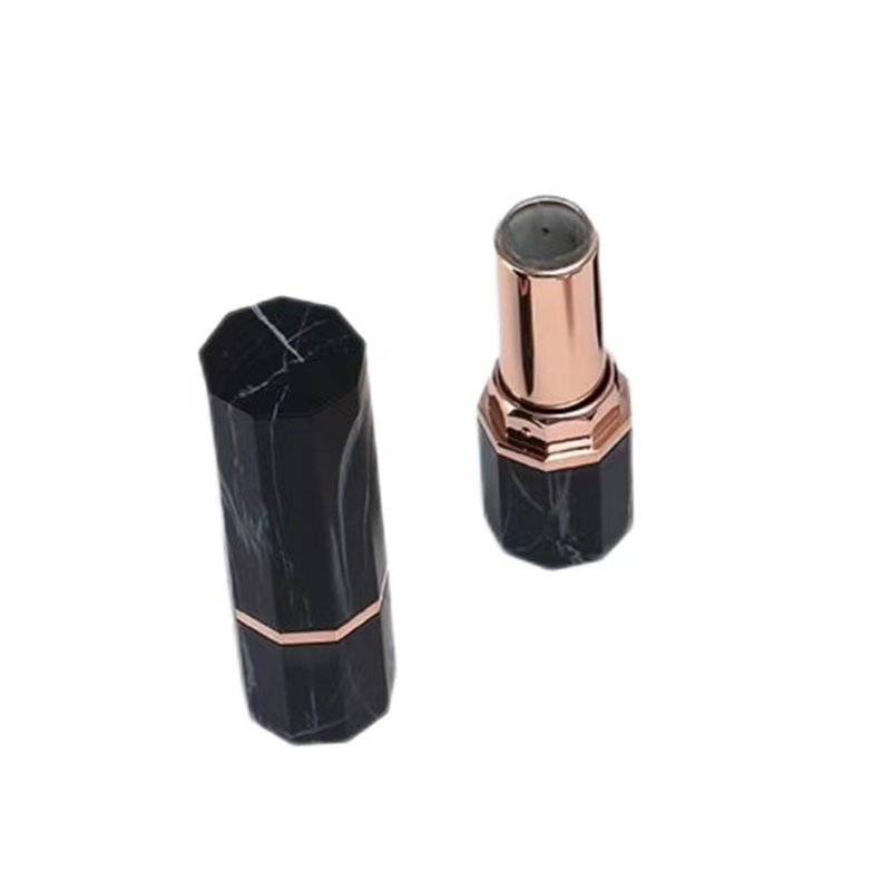 Container de tube octagonal en marbre noir de luxe avec accent or rose