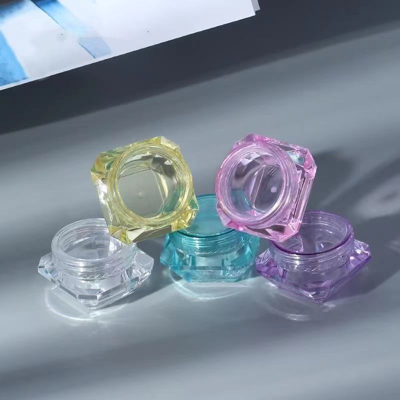 Pot de crème transparent de voyage portable en matériau PS 3g 5g avec plusieurs options de couleurs, supportant l'impression sérigraphique couleur personnalisée, utilisé pour l'emballage de soins de la peau
