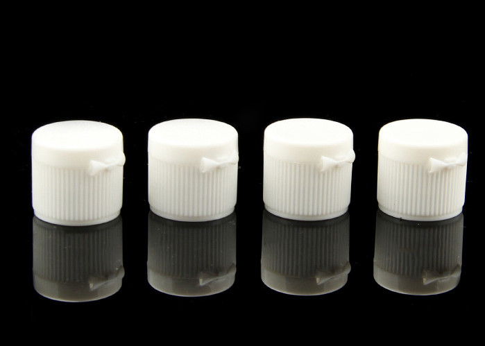 les capsules cosmétiques 20mm en plastique de 18mm renversent la surface à nervures blanche supérieure adaptée aux besoins du client